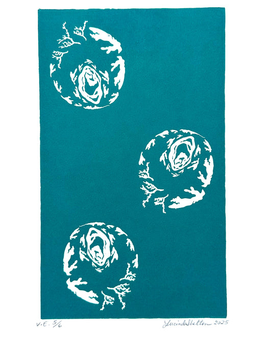 Three white circular patterns of white coral representing the global oceans on a teal blue background